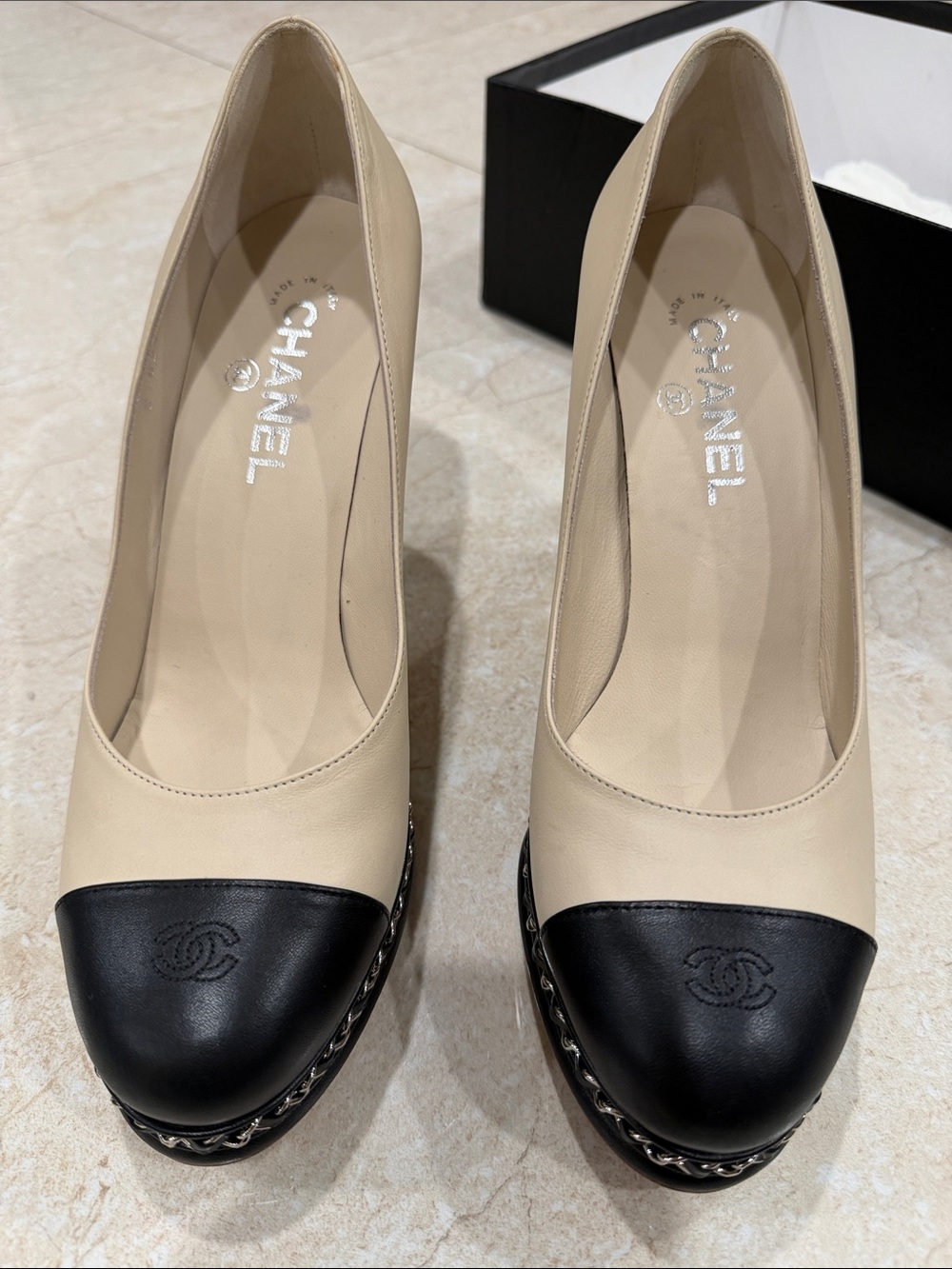 CHANEL Beige and Black Cap-Toe Leather Pumps with Chain Trim